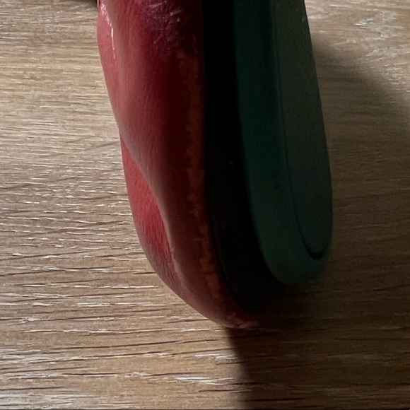 Red Tieks.Good condition.There is a scoff on the front and small at back. - Picture 2 of 3